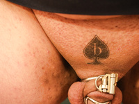 Beta Dicklette with a Big Beta Tattoo