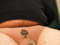 Beta Dicklette with a Big Beta Tattoo
