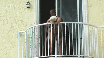horny milf on the balcony with black bf
