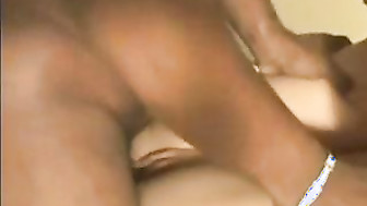 Milf treats her mouth and slit with two massive black cocks