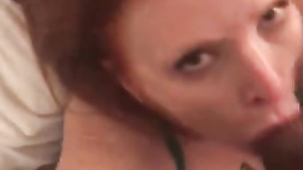 Redhead Milf sucking on Black Cock with Facial Finish