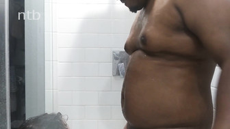 Shorthair brunette takes big black cock in the shower