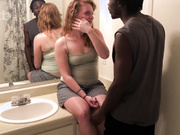 Fiery redhead with big belly gets fucked by her hung black lover in bathroom