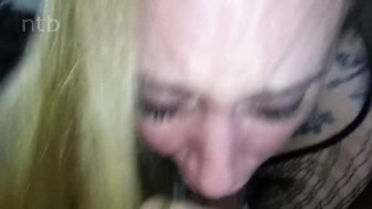 Sexy blond in black body fishnets receives big black cocks in her pussy and mouth