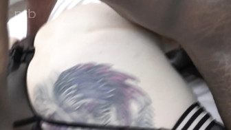 Hot redhead in black stockings and garters got fucked bareback by her black stud