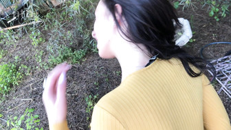 Hot brunette gives head in the garden