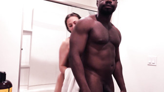 Sexy redhead and her hung black stud take a shower and shags a little bit