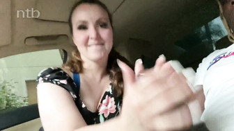 Redhead white MILF sucks that huge black cock while driving his car