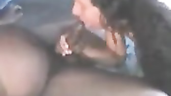 Sex Kitten on her knees throating a fat daddy's throbbing black cock