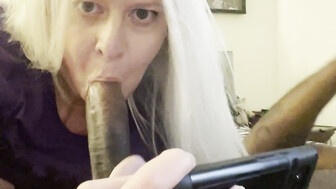 Platinum blonde slut records herself sucking a big cock