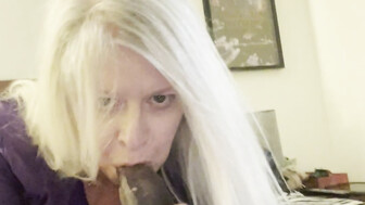 Platinum blonde slut records herself sucking a big cock