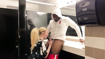 Hot Blonde Sucks and Fucks Her Black Man in a Restroom
