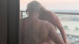 Husband records wife with BBC on balcony