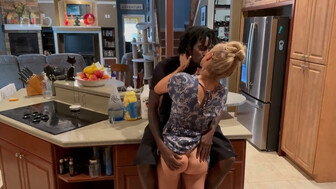 Horny blonde housewife in the kitchen with black lover