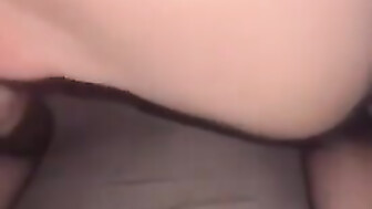 Opening her pussy to feel a black cock