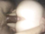 Stretching out her pussy with BBC strap on