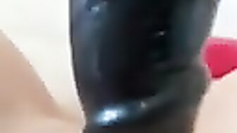 Wife takes 11 inch BBC dildo deep inside pussy