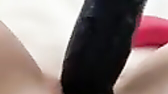 Wife takes 11 inch BBC dildo deep inside pussy