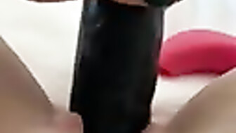 Wife takes 11 inch BBC dildo deep inside pussy