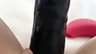 Wife takes 11 inch BBC dildo deep inside pussy