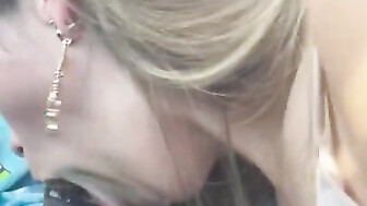 Sexy white chick swallows black cock in the car