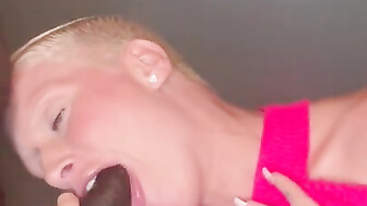 Shorthair blonde gives sloppy head to black dick