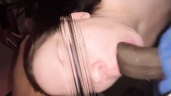 Stuffing hard black dick in her mouth she loves it