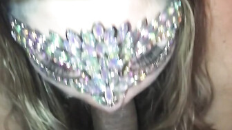 White girl in mask blows black cock