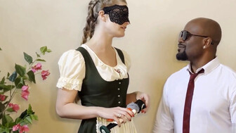 A beautiful blonde in a mask and a strong guy