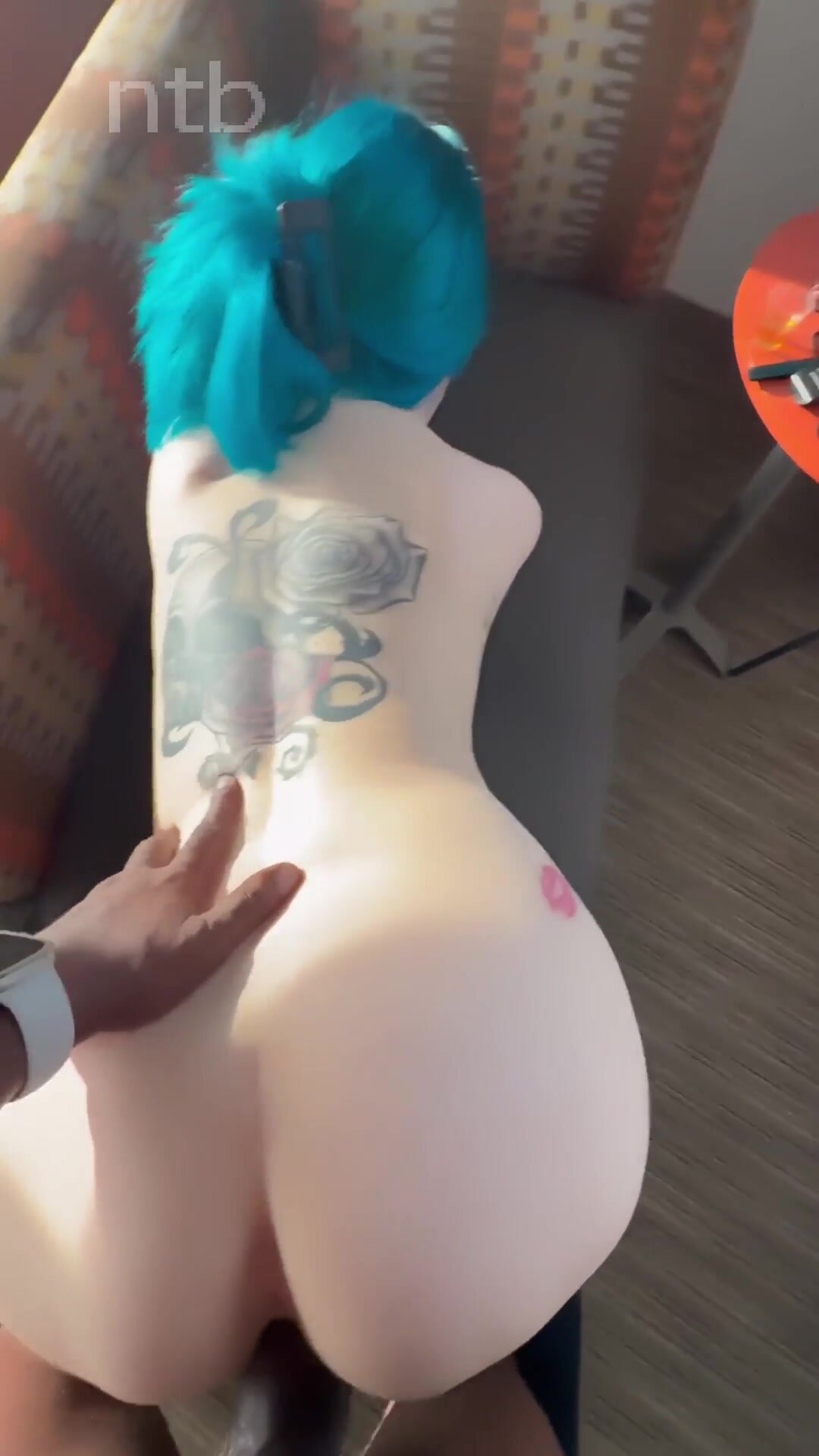 Tatted hottie with blue hair worships black cock