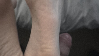Gf plays with my cock with her pretty feet
