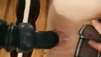 Wife in stockings and a black dildo